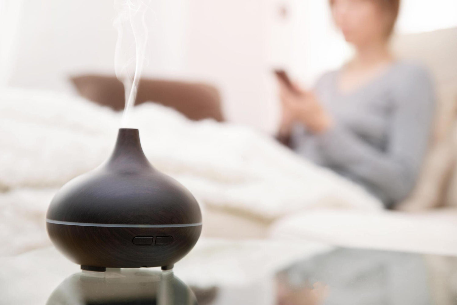 Image By gettyimages.ae, Close up of air humidifier and aroma diffuser in living room.